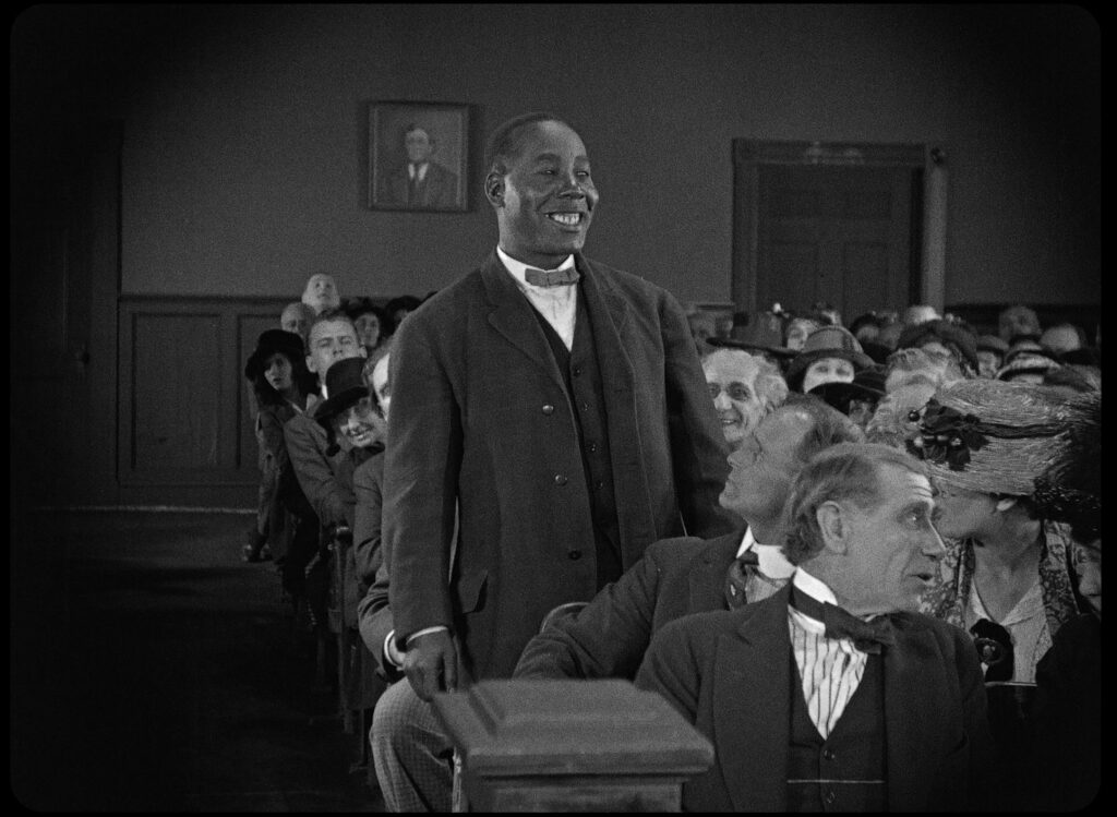 George Reed in scene from ONE A MINUTE (1921)