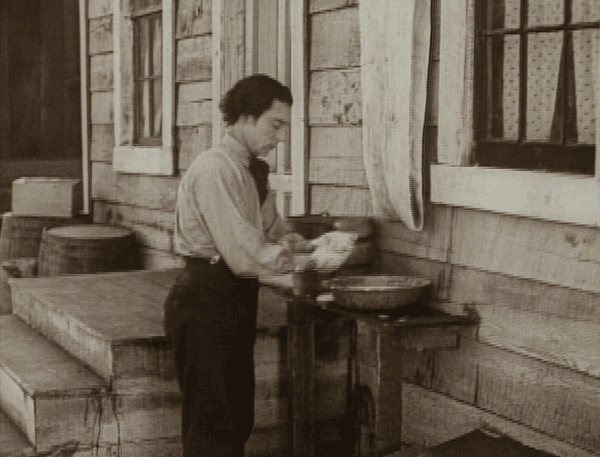 Buster Keaton washing his hands GIF